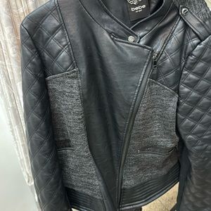 Black leather jacket with fabric on back